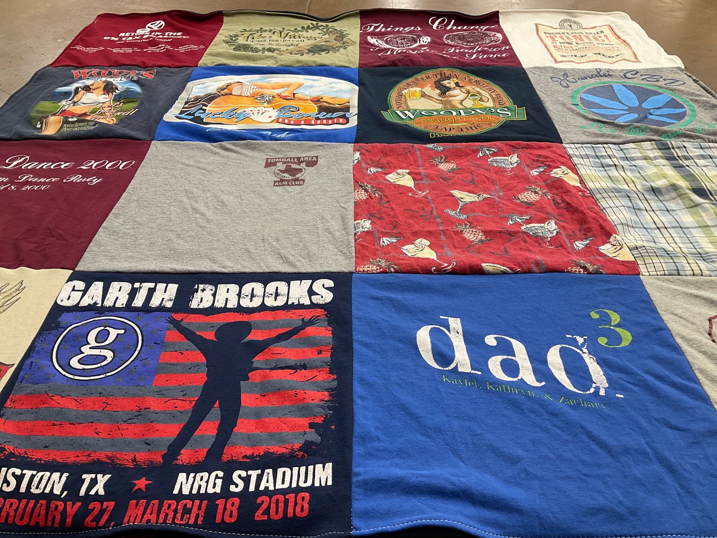 T-shirt quilt with country music, community events themes by Kristin from TX