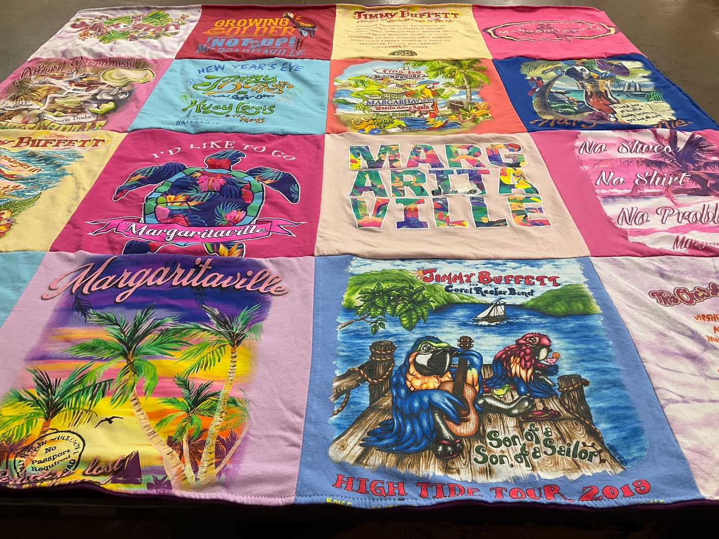 T-shirt quilt with beach, music themes by Vickie from MO