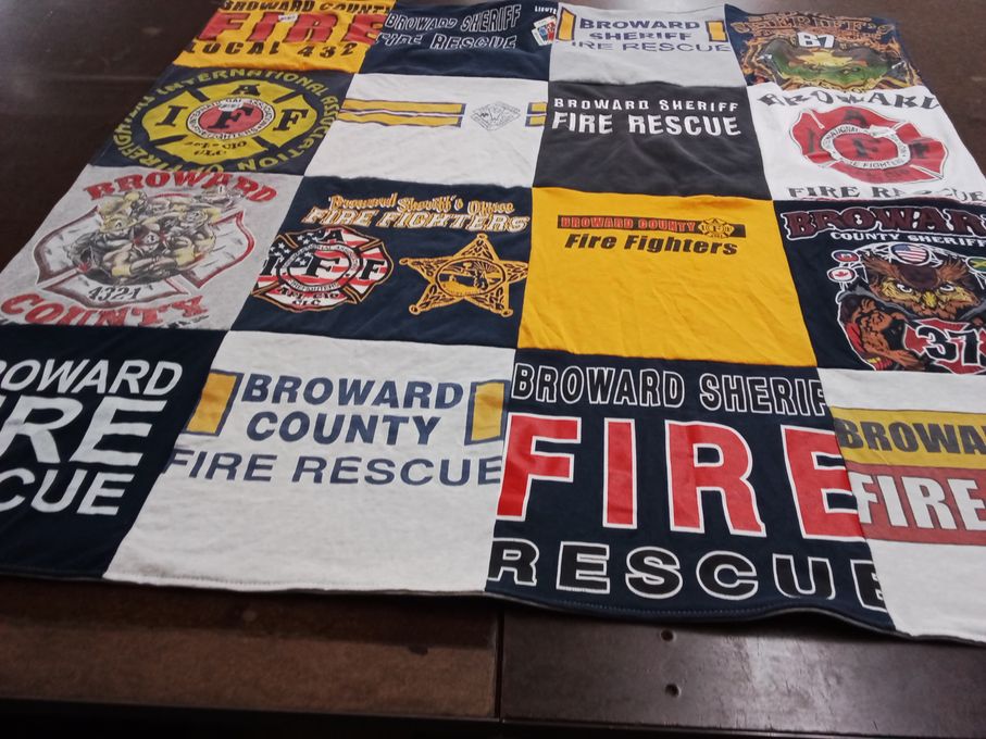 T-shirt quilt with firefighting, emergency services themes by Philip from FL