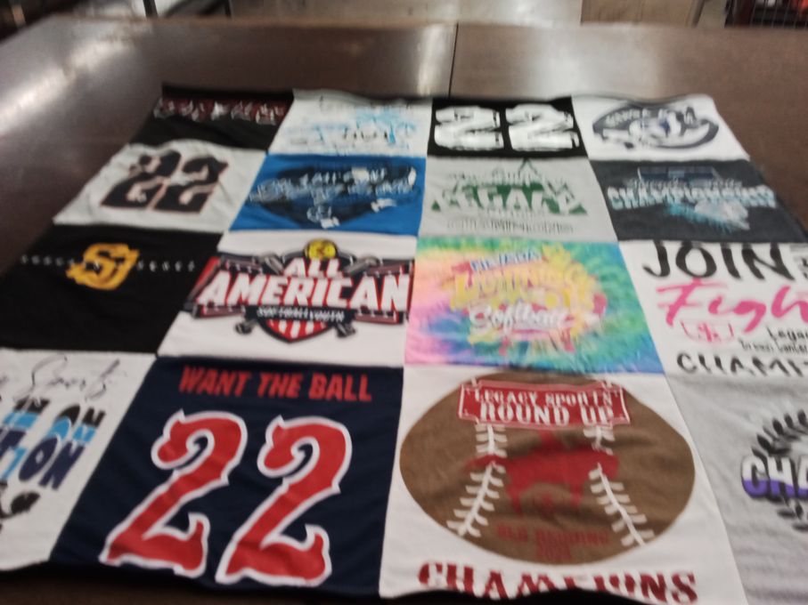 T-shirt quilt with softball, soccer themes by Kimberly from NV