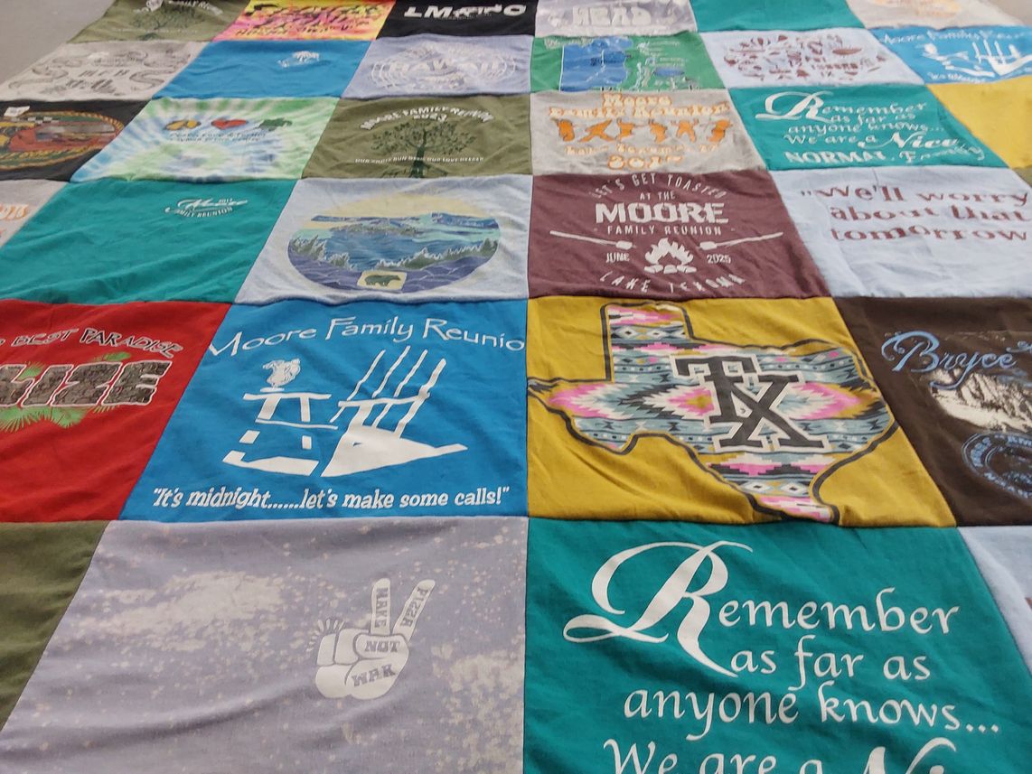 T-shirt quilt with family reunions, travel themes by Janet from TX