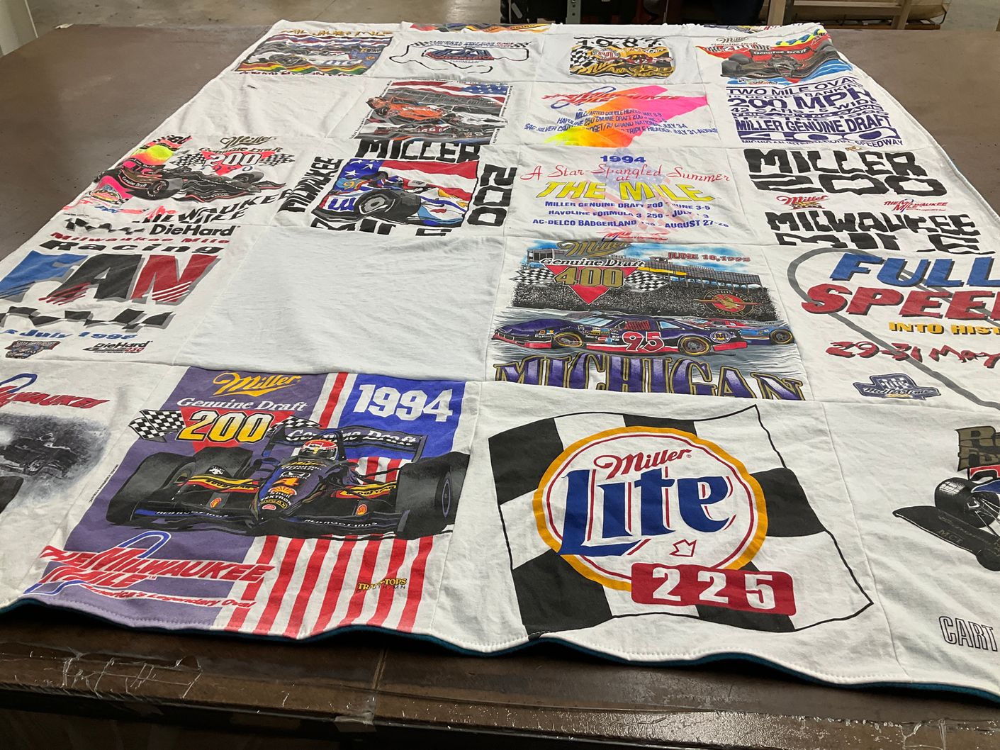 T-shirt quilt with racing, motorsports themes by Kathy from ND