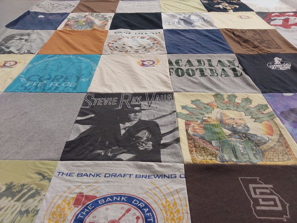 T-shirt quilt with music, football themes by Angela from LA