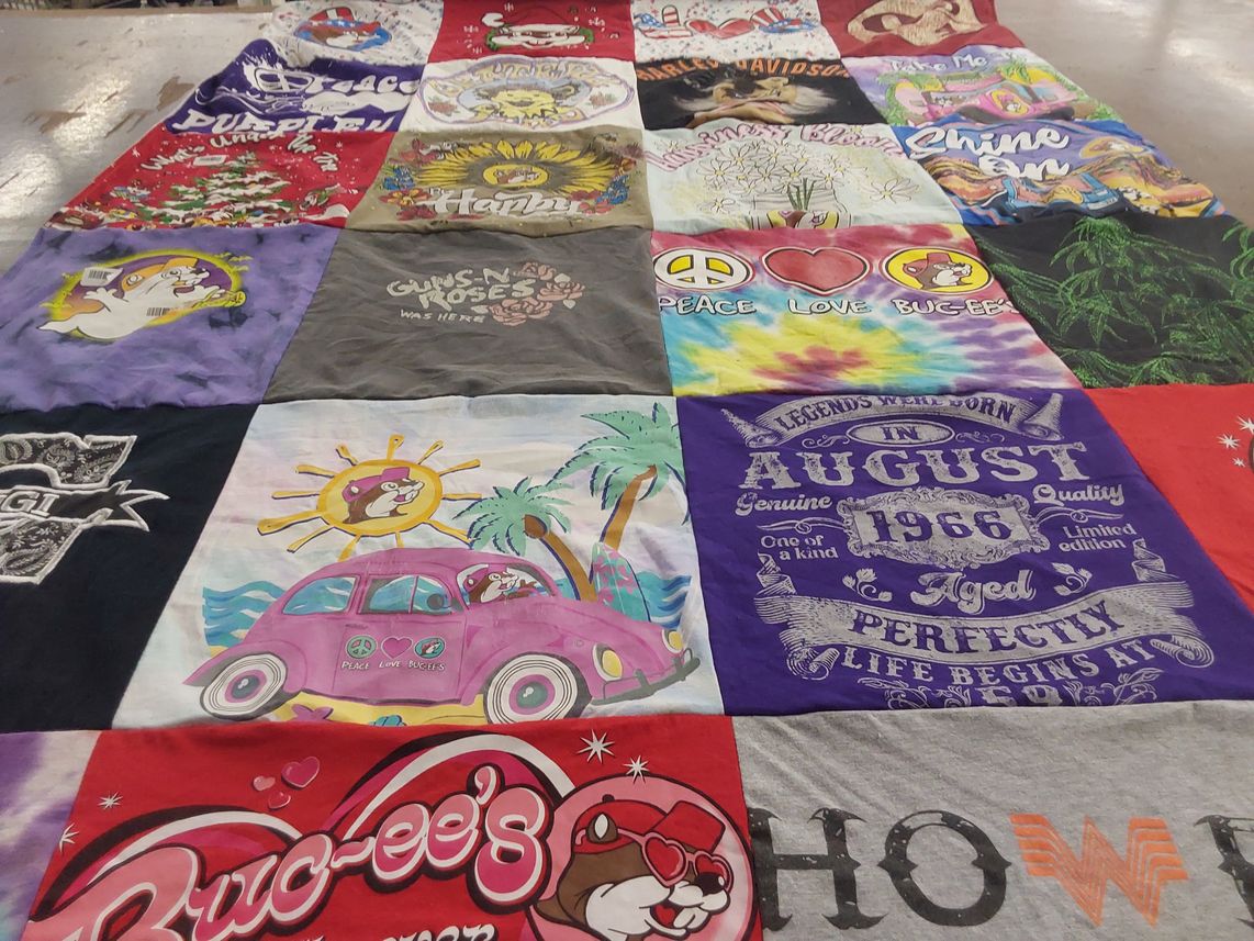 T-shirt quilt with music, travel themes by Vivian from TX