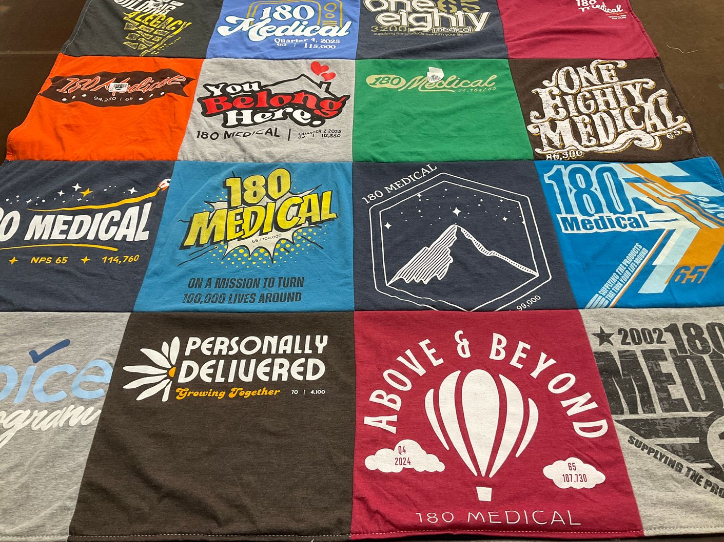 T-shirt quilt with healthcare, community themes by Lindsay from MA