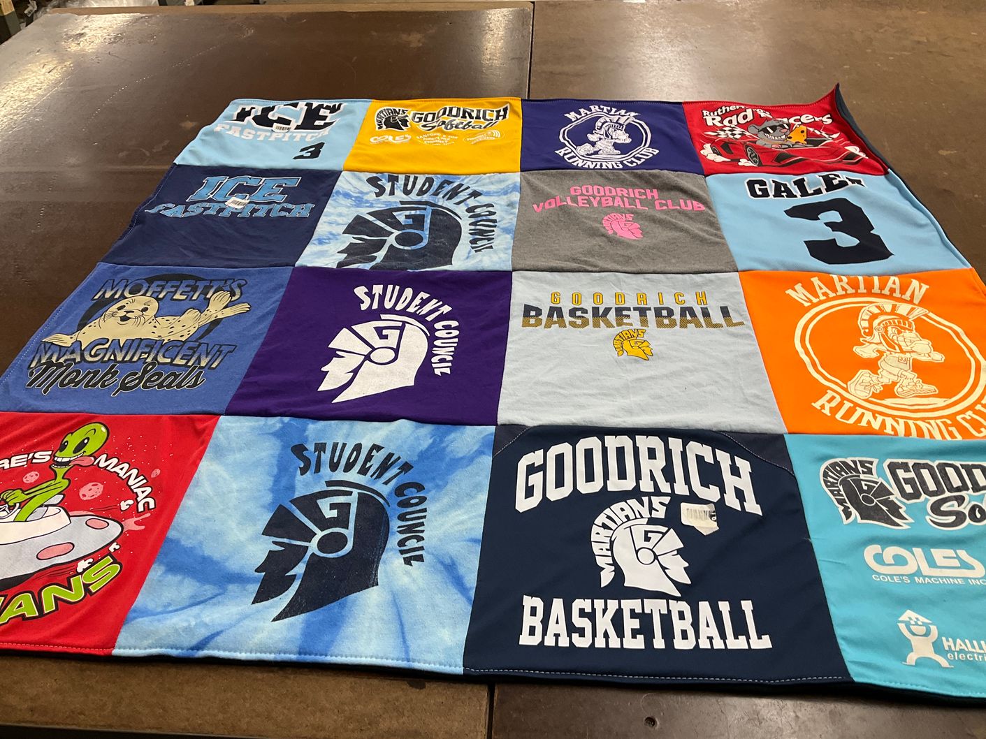 T-shirt quilt featuring goodrich basketball, martian running club by Tricia from MI