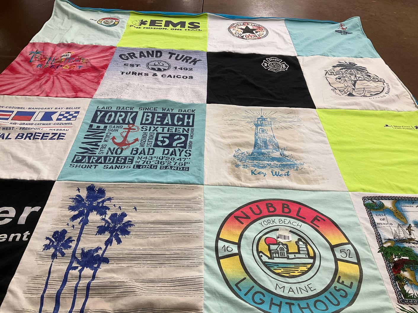 T-shirt quilt with travel, beach themes by Angela from NH