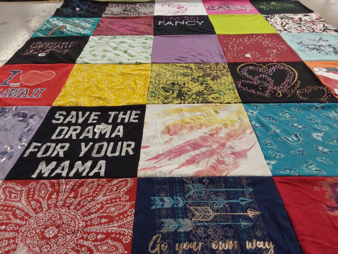 T-shirt quilt with humor, travel themes by April from SC