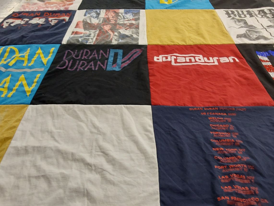 T-shirt quilt with music, concerts themes by Angie from AR