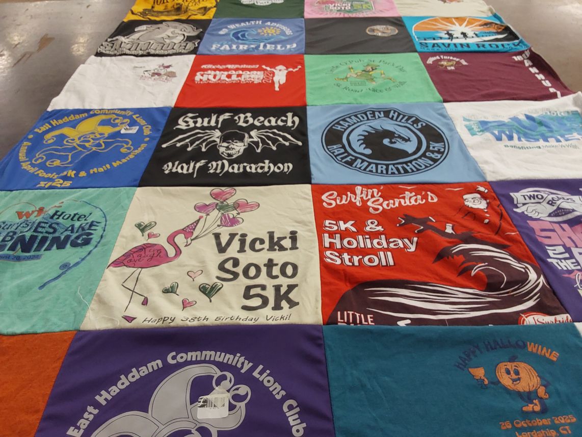 T-shirt quilt with running, marathons themes by Sarah from CT