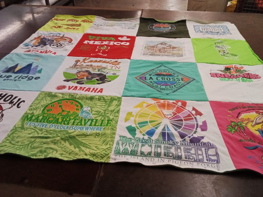 T-shirt quilt with travel, beaches themes by Elizabeth from MS