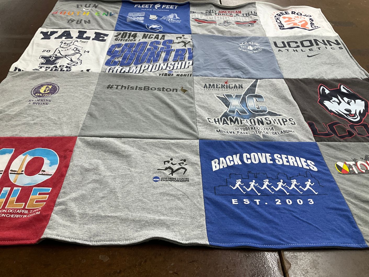 T-shirt quilt featuring university of connecticut cross country by Emily from CO