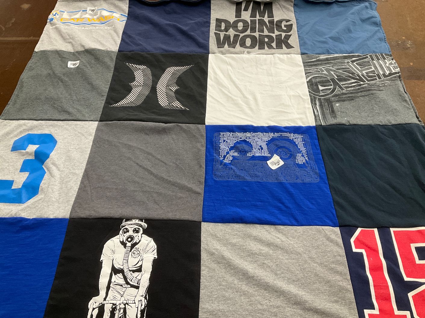 T-shirt quilt with automotive, graphic design themes by Meghan from NJ