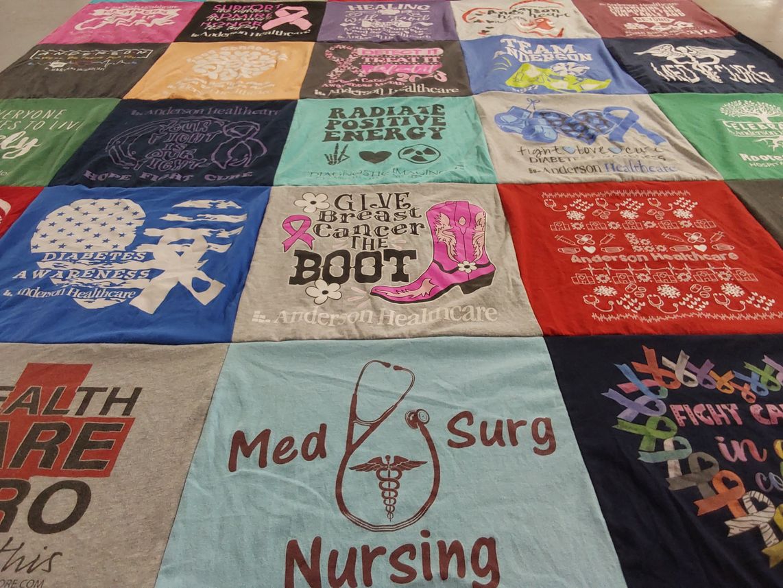 T-shirt quilt with health, nursing themes by Lisa from IL