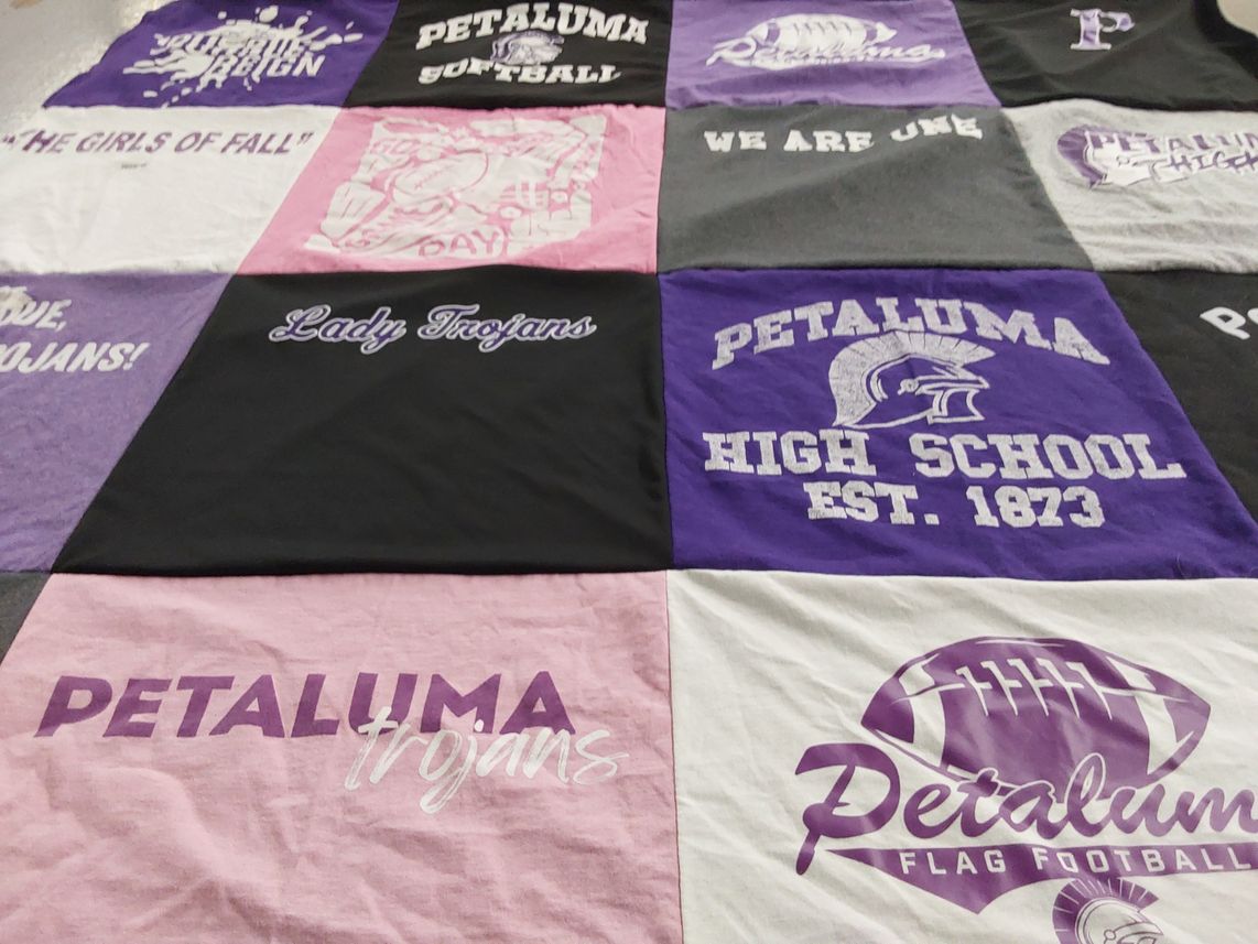 T-shirt quilt featuring petaluma trojans by Christine from CA
