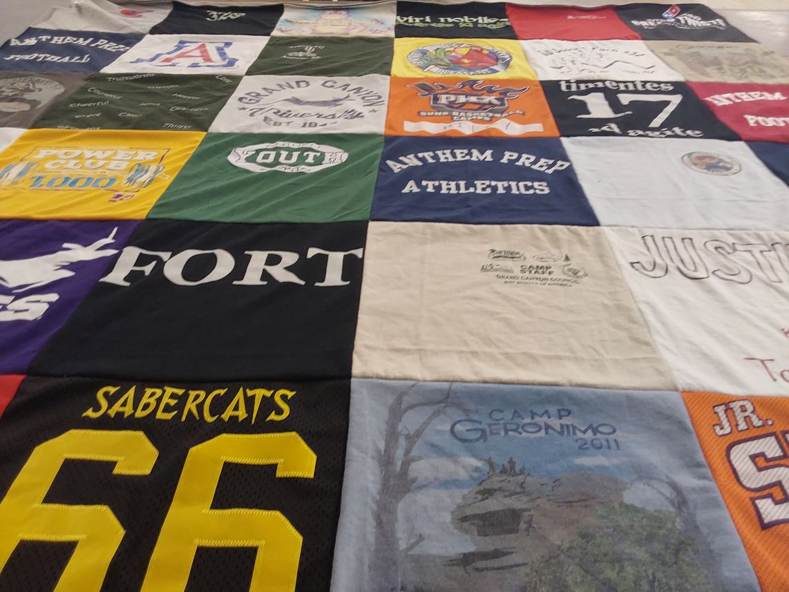 T-shirt quilt featuring saber cats by Sarah from AZ