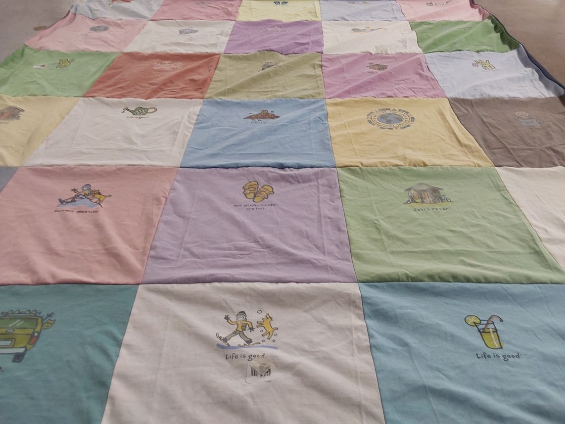 T-shirt quilt with outdoor activities, relaxation themes by Kara from NH