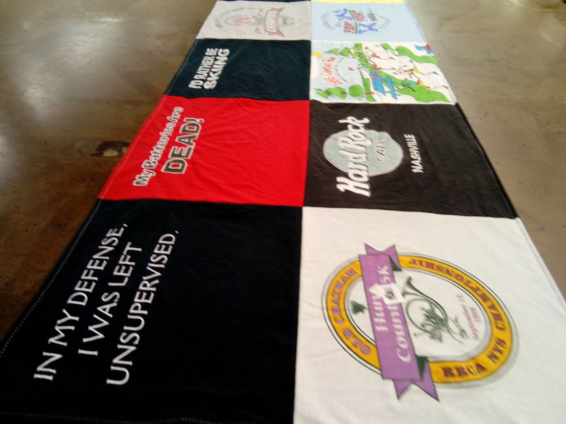 T-shirt quilt with skiing, hard rock themes by Sherry from NY