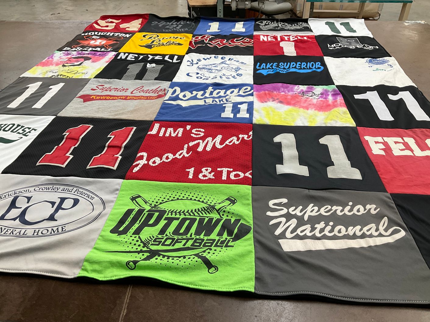 T-shirt quilt featuring up town softball by Drew from MI