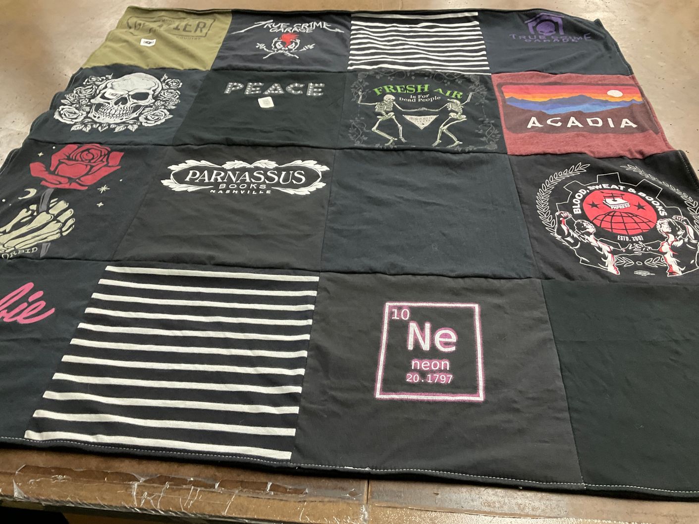 T-shirt quilt with reading, books themes by Elizabeth from TN