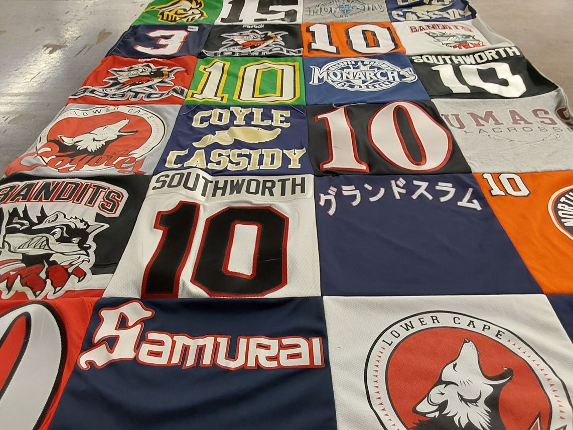 T-shirt quilt with lacrosse themes by Ken from MA