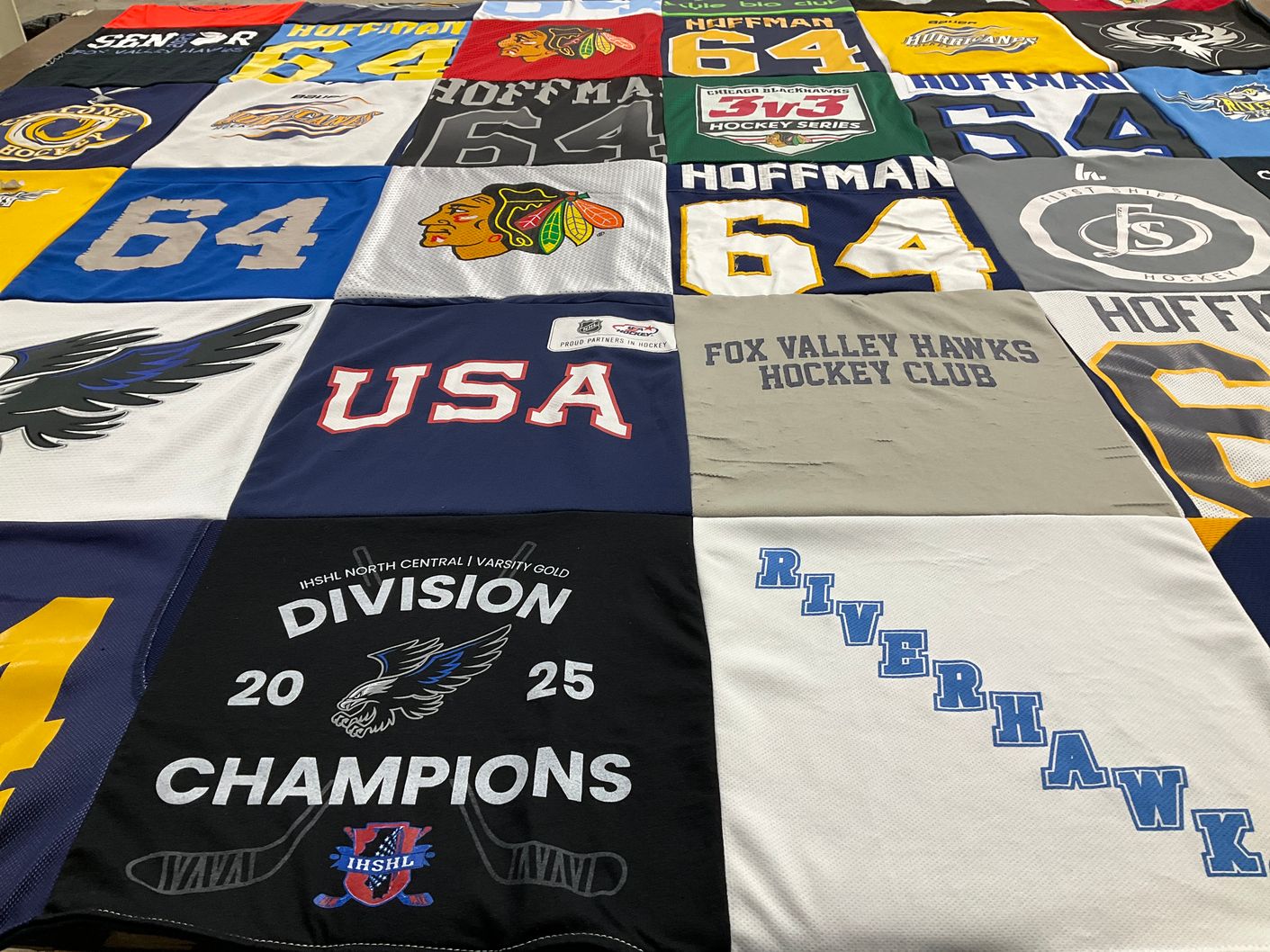 T-shirt quilt with hockey, sports themes by Kristy from IL