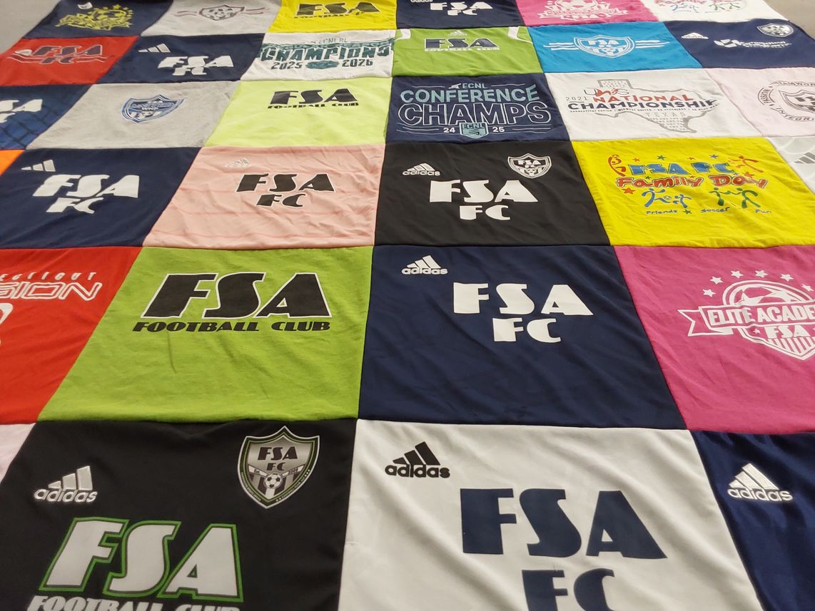 T-shirt quilt with soccer, family themes by Susan from CT