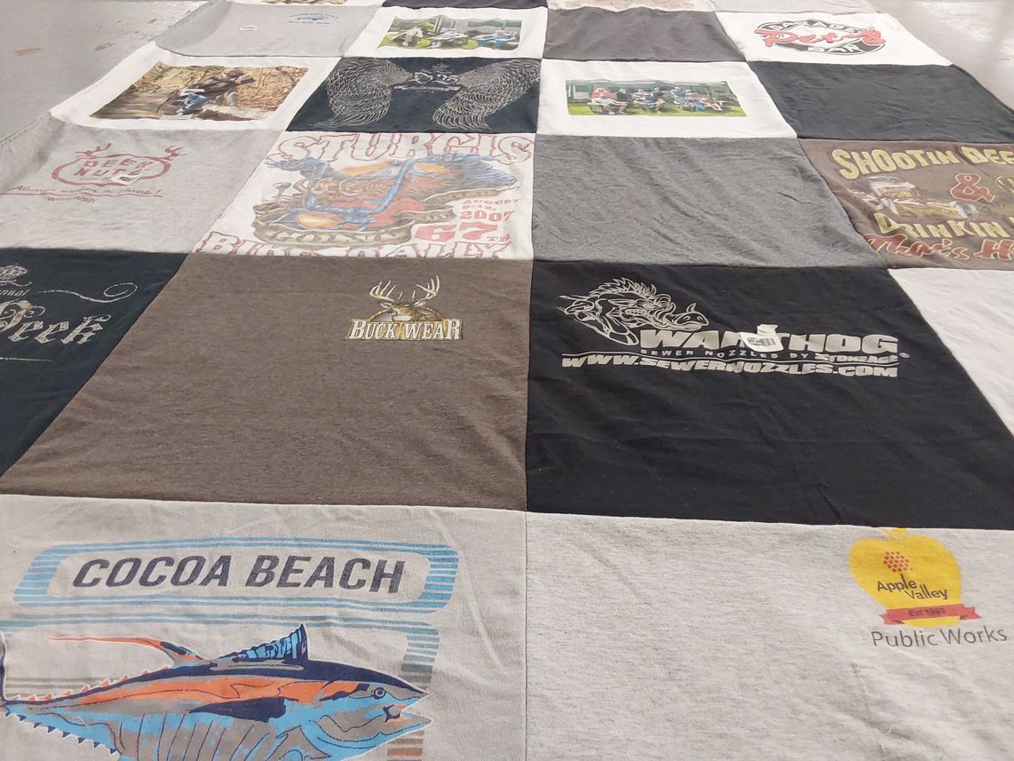 T-shirt quilt with fishing, hunting themes by Charles from WI