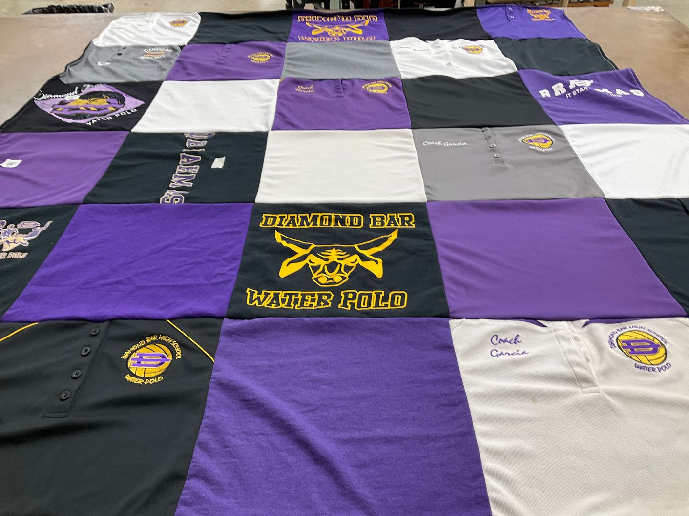 T-shirt quilt featuring diamond bar water polo by Megan from CA