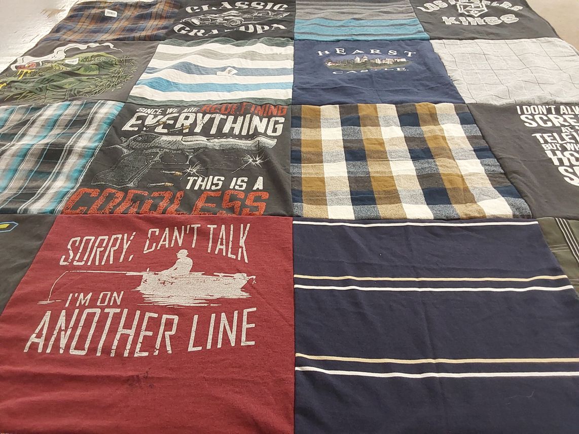 T-shirt quilt with fishing, television themes by Sandy from CA