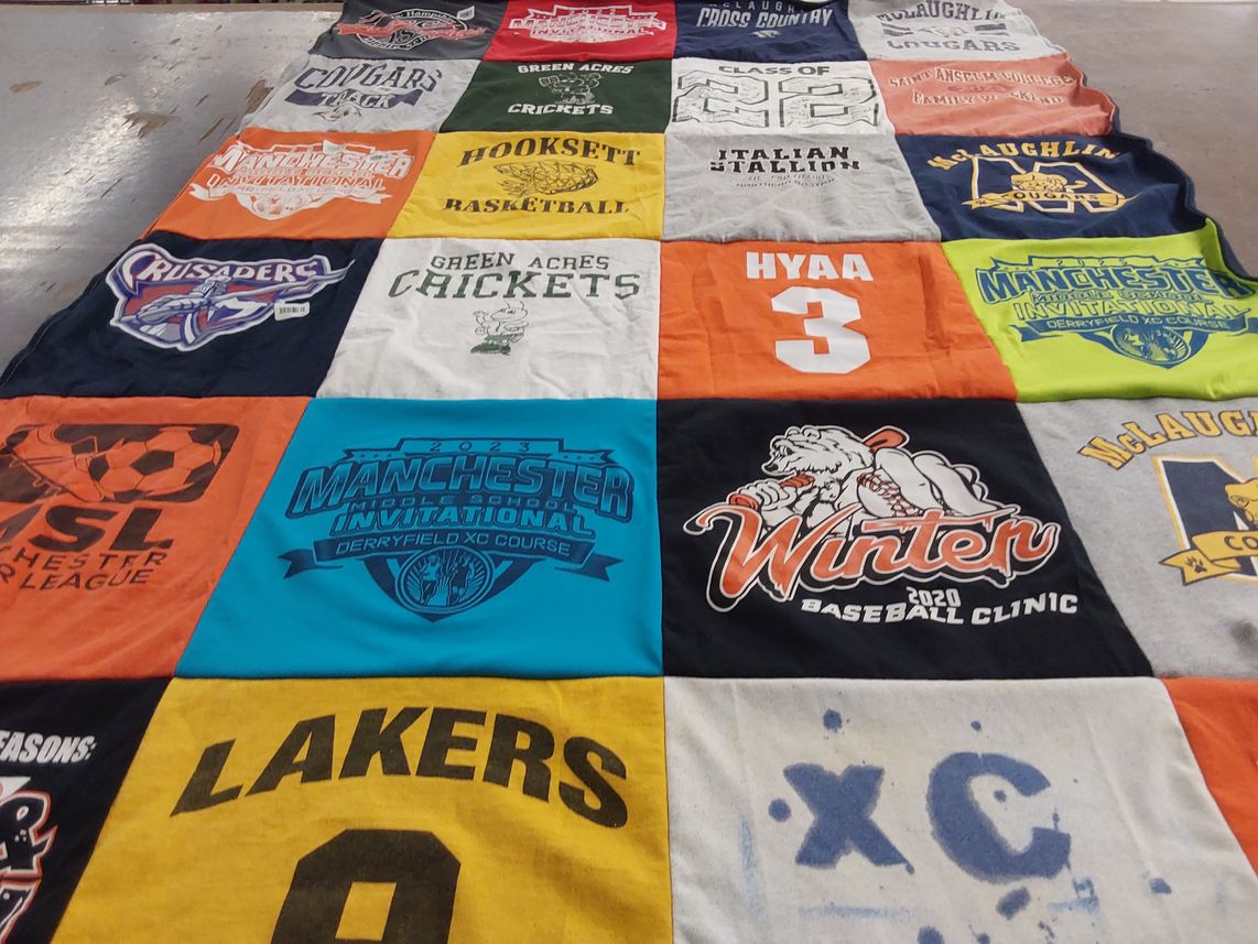 T-shirt quilt featuring lakers, crusaders by Emma from NH