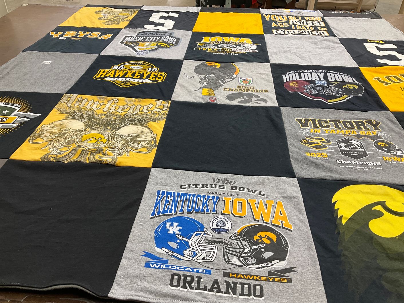 T-shirt quilt featuring iowa hawkeyes, kentucky wildcats by Cami from IA