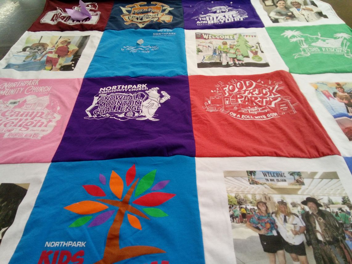 T-shirt quilt with community events, outdoor activities themes by Candi from CA