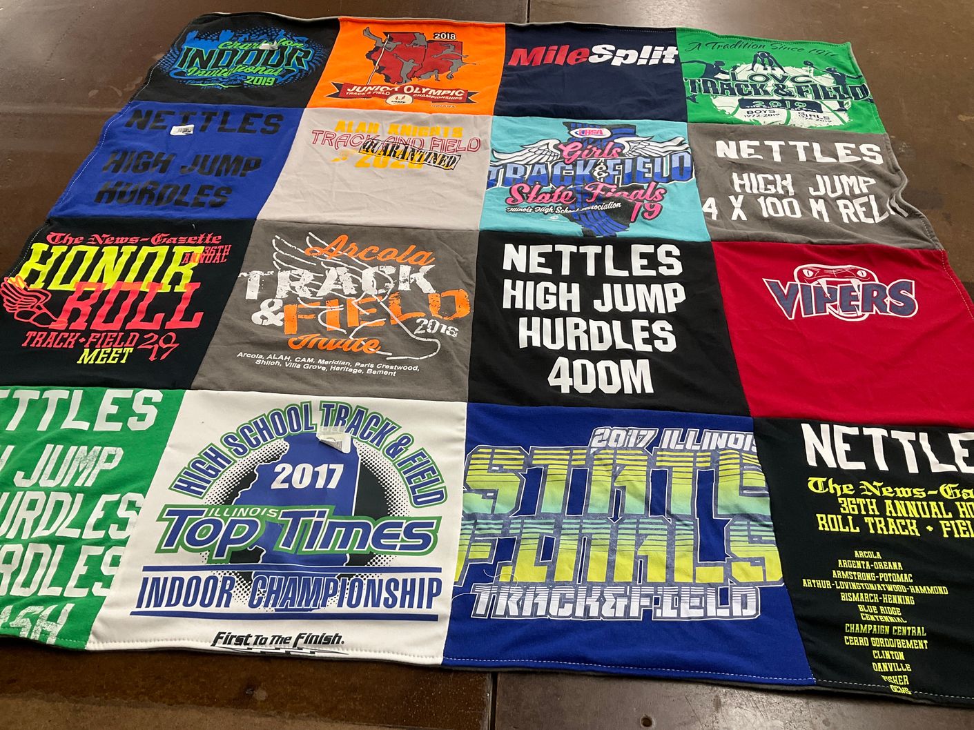 T-shirt quilt featuring nettle high jump team by Christi from IL