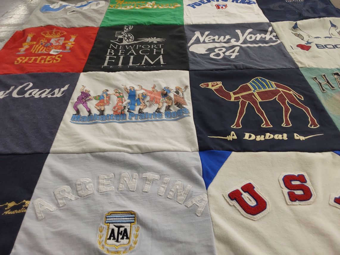 T-shirt quilt with travel, film festivals themes by Alex from FL