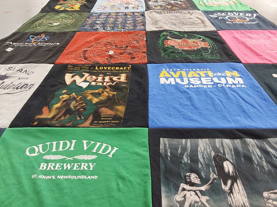 T-shirt quilt with literature, science themes by Maria from GA