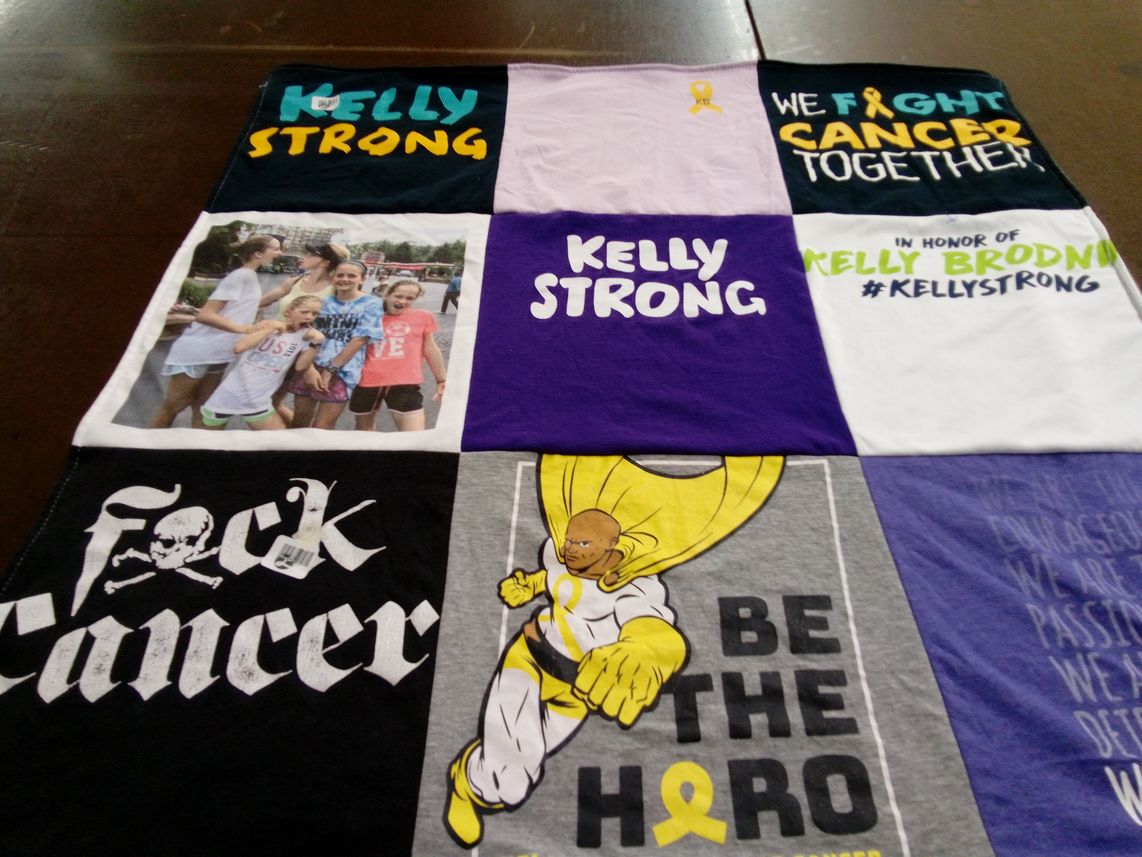 T-shirt quilt with cancer awareness, community support themes by Renee from VA
