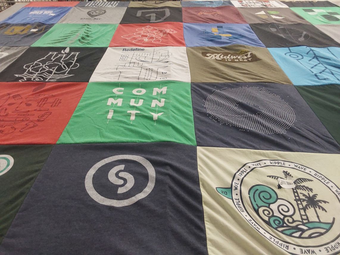 T-shirt quilt with community, fitness themes by Amanda from NE