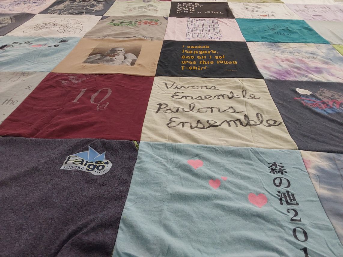 T-shirt quilt with t-shirts themes by RoseE from MN