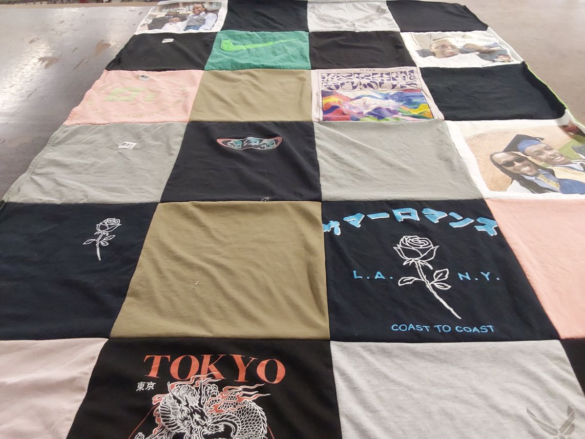 T-shirt quilt with travel, culture themes by Ashley from GA