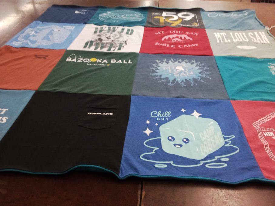 T-shirt quilt with camping, outdoor activities themes by Olivia from MI