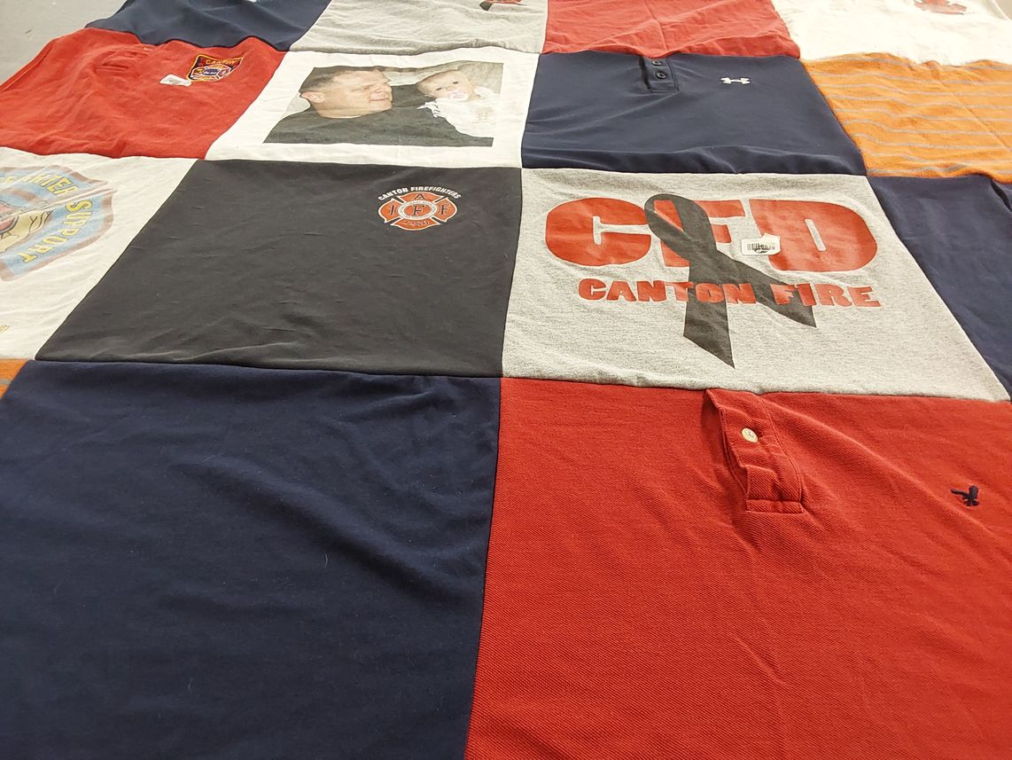 T-shirt quilt with emergency services, firefighting themes by Laurie from MI