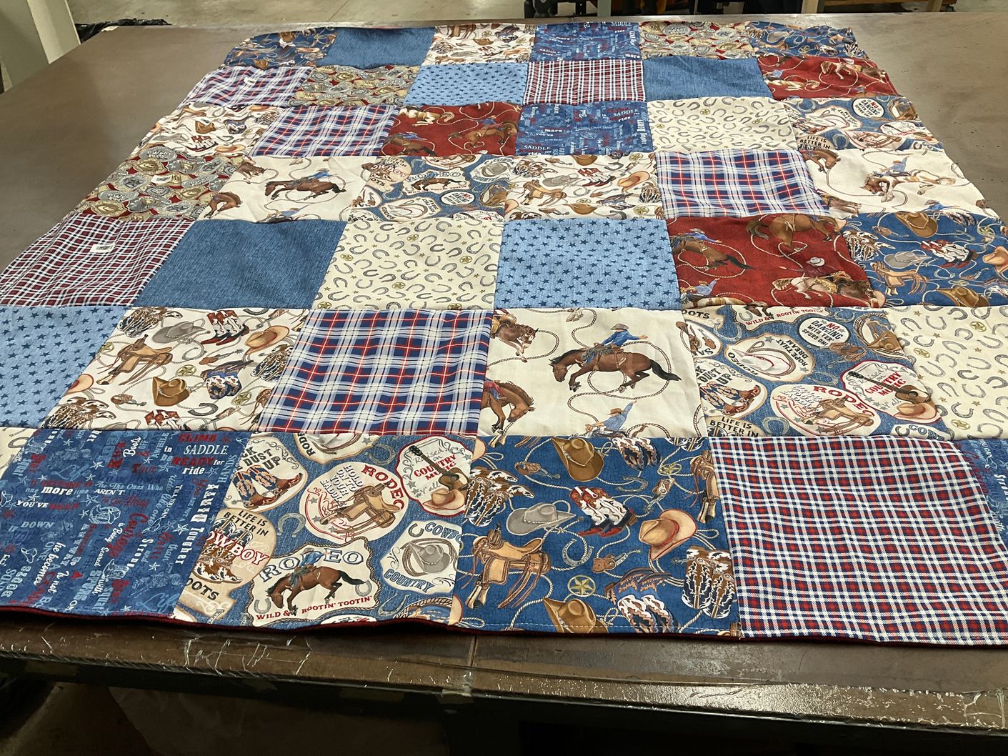 T-shirt quilt with rodeo, western culture themes by Michelle from CA