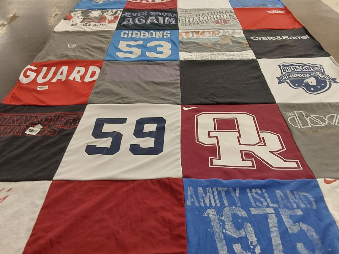 T-shirt quilt from orange high school by Doria from TN