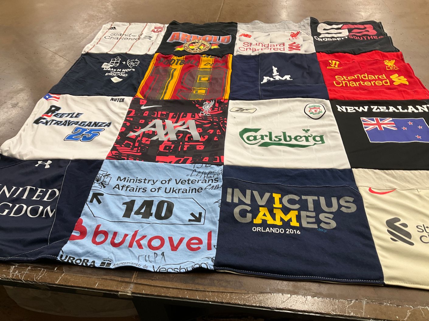 T-shirt quilt with football, sports themes by Sarah from CA