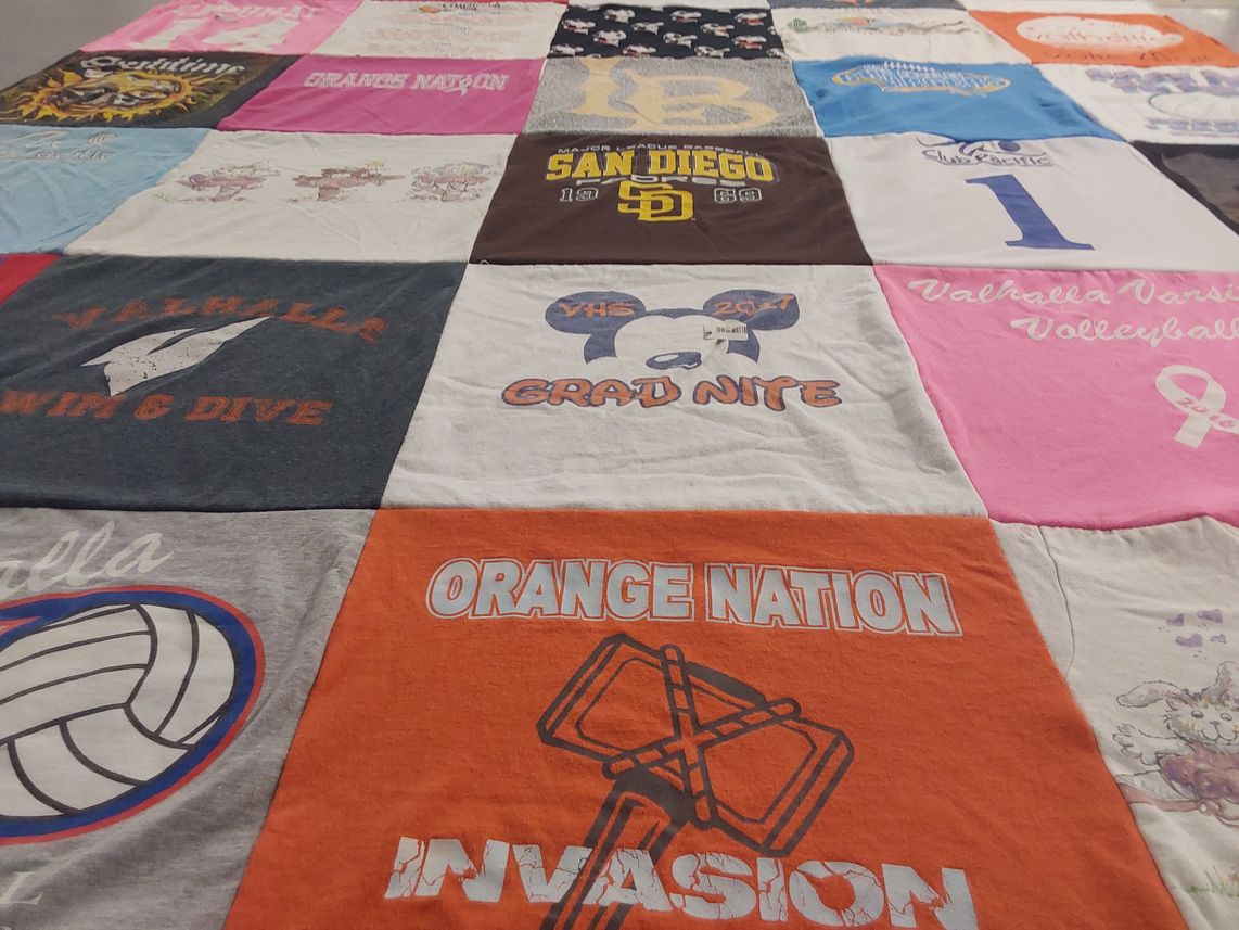 T-shirt quilt featuring valhalla high school swim team, valhalla high school volleyball team by Kim from CA