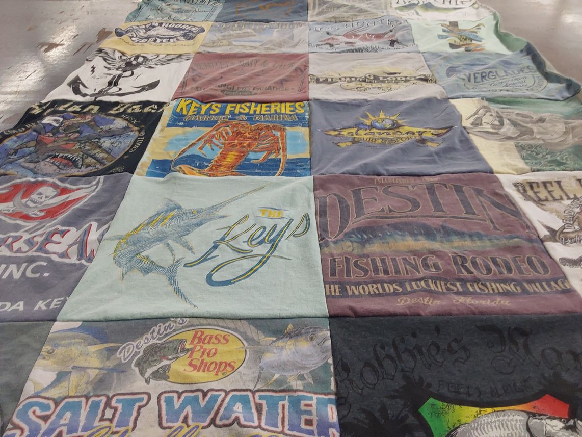T-shirt quilt with fishing, marine life themes by April from FL