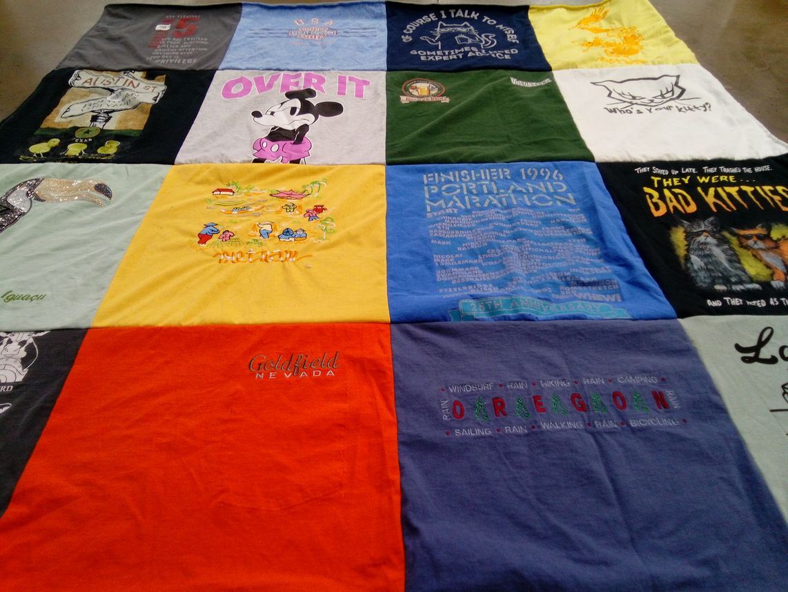 T-shirt quilt with running, outdoors themes by April from NV