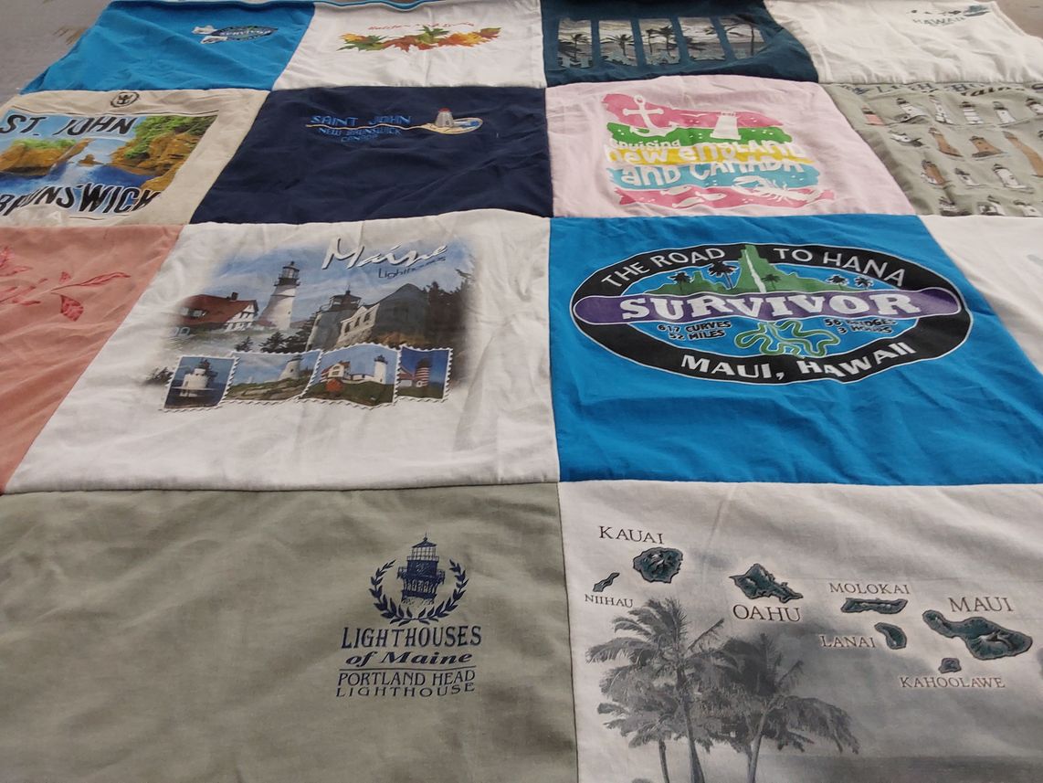 T-shirt quilt with travel, tourism themes by Vicki from TX