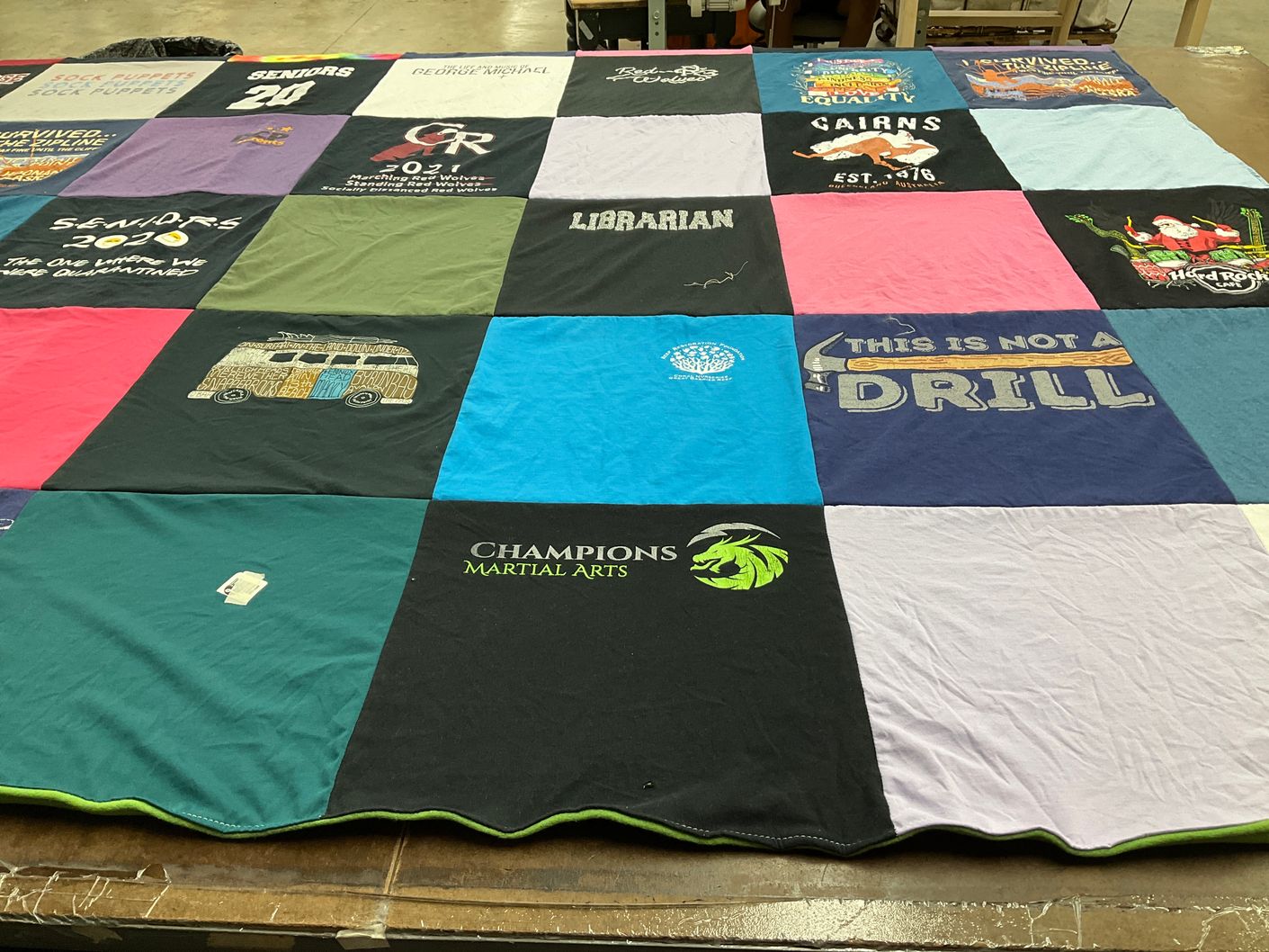 T-shirt quilt with martial arts, library themes by Erin from NC